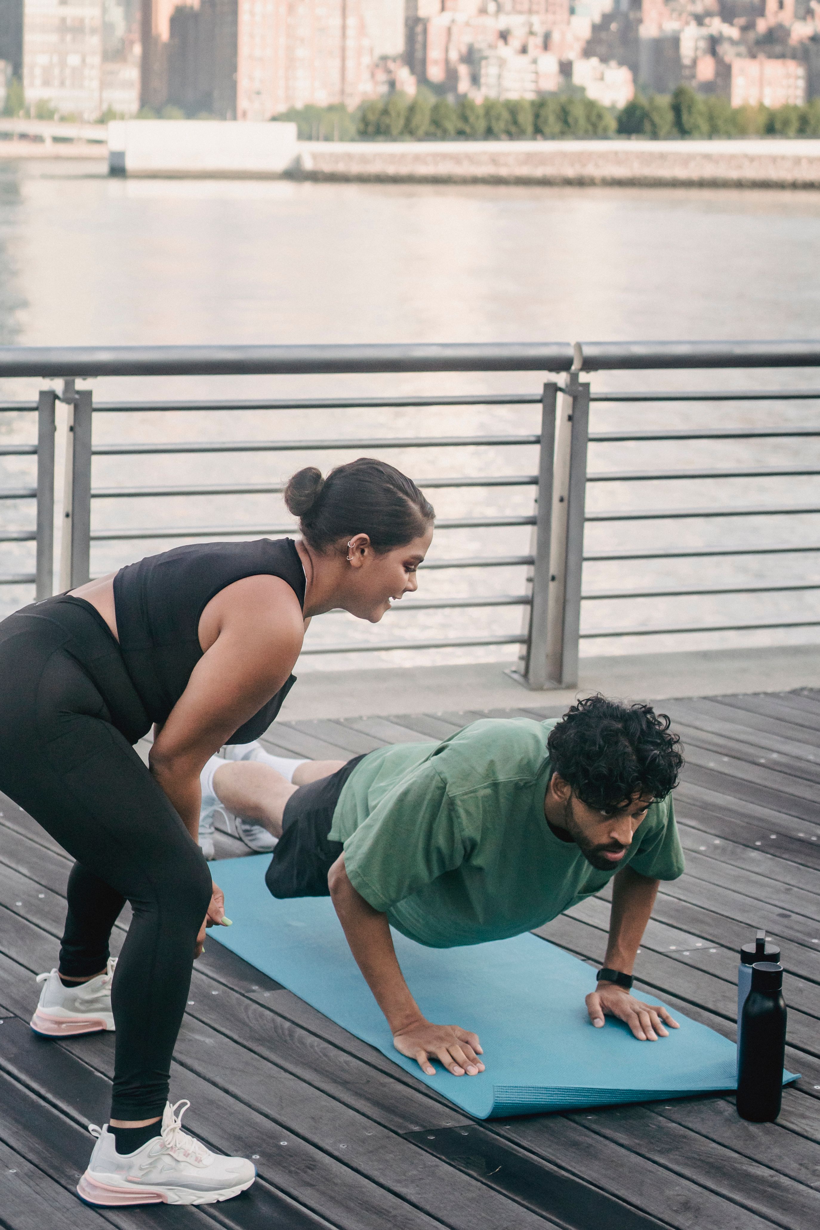Partner encouraging during a push-up set